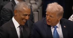 Barack Obama and Donald Trump talking during Jimmy Carter's funeral