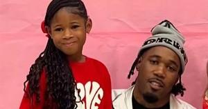 Rapper Lil Ronnie with his daughter