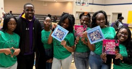 Daniel Moijueh with students