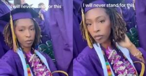 Black woman sitting during national anthem at college graduation