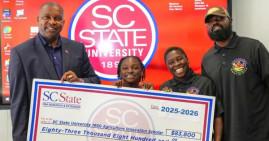 Kendall Rae Johnson receiving scholarship