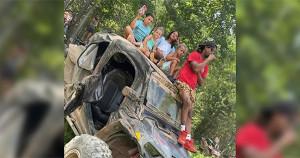 Marcus Ragland, Ashley Brooke Hawkins, and their seven children