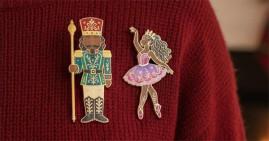 Black nutcracker and ballerina wearable pins