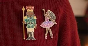 Black nutcracker and ballerina wearable pins