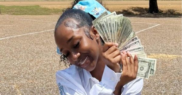 Mom of 1-Year-Old Boy Shot by Police Controversially Flashes Cash at Her Son's Funeral