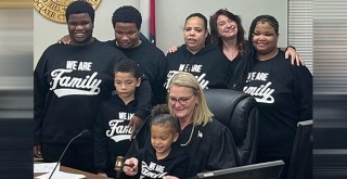 La Tonya Ruff with her siblings and the judge