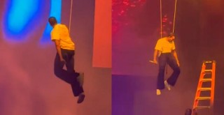 Chris Brown stuck hanging in the air at a concert
