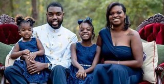 Raymond and Nekeeya Brewster with their kids