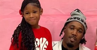 Rapper Lil Ronnie with his daughter