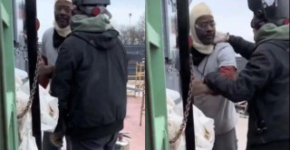 Black construction worker and his white co-worker